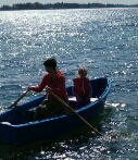 woman and child in row boat